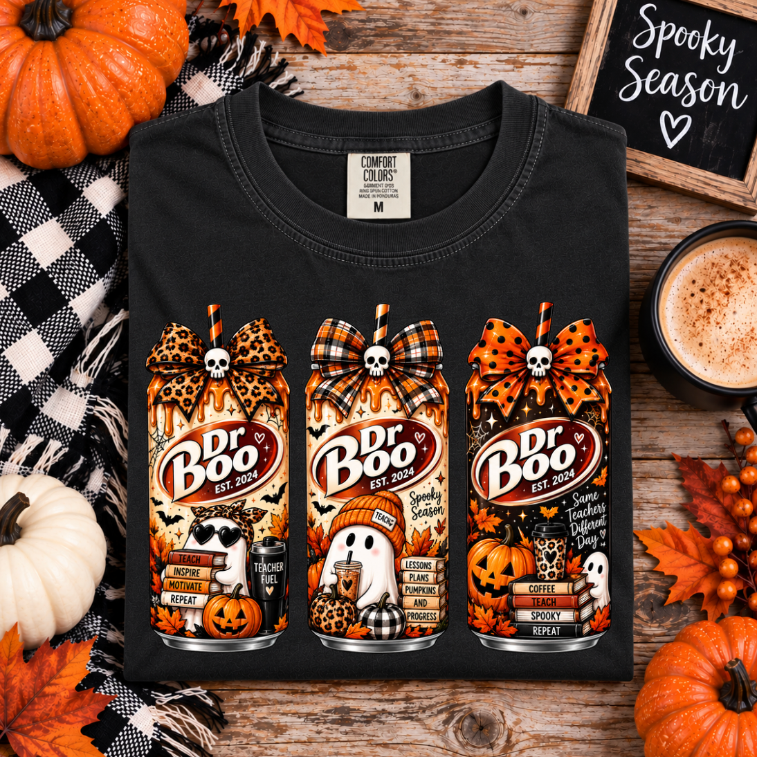 Halloween teacher shirt in black with retro spooky drink graphics and fall classroom details.