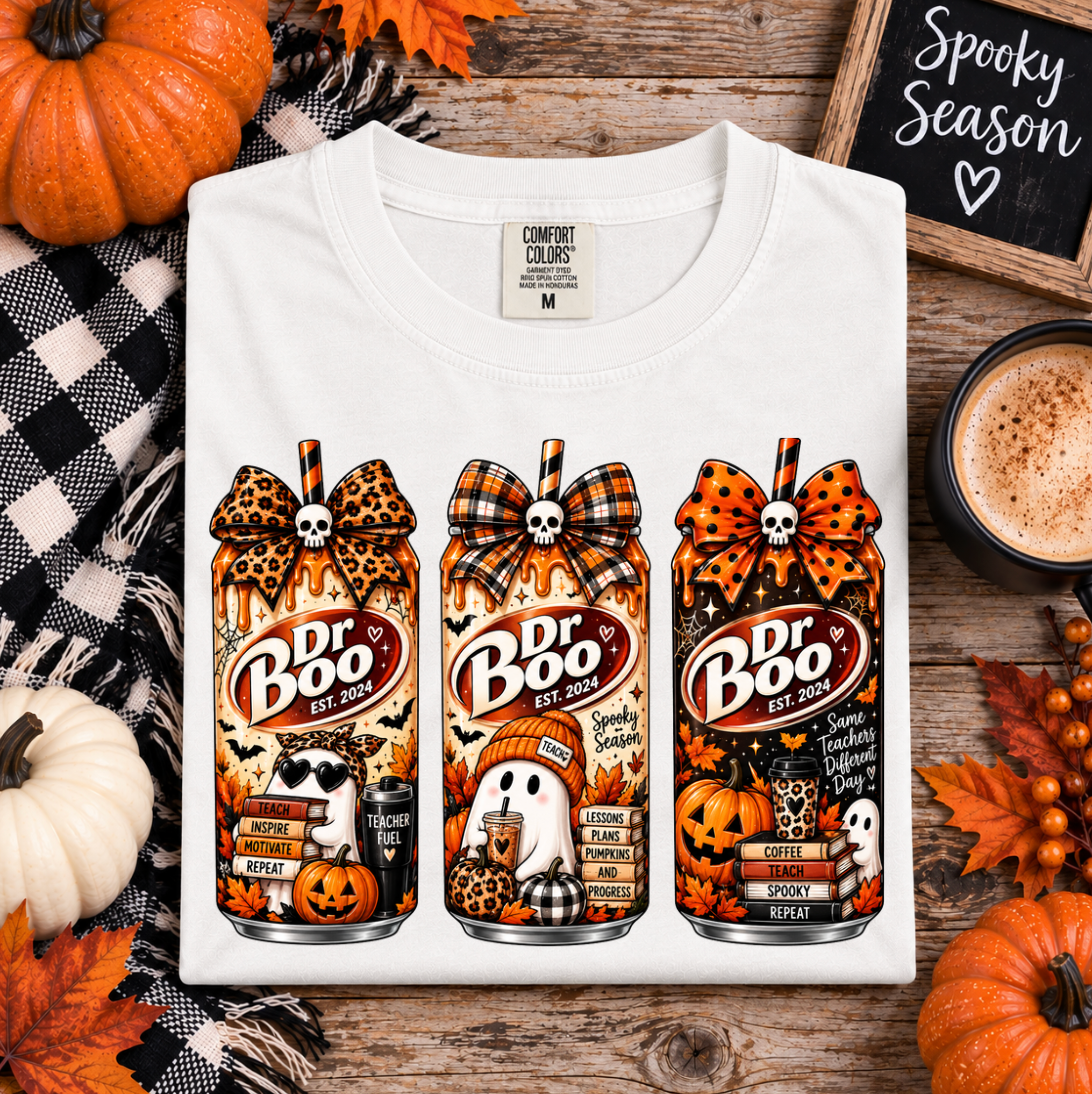 Halloween teacher shirt in white with retro spooky drink graphics and fall classroom details.