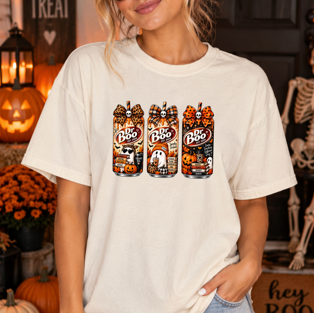 Halloween teacher shirt with retro spooky drink graphics on a ivory Comfort Colors tee.