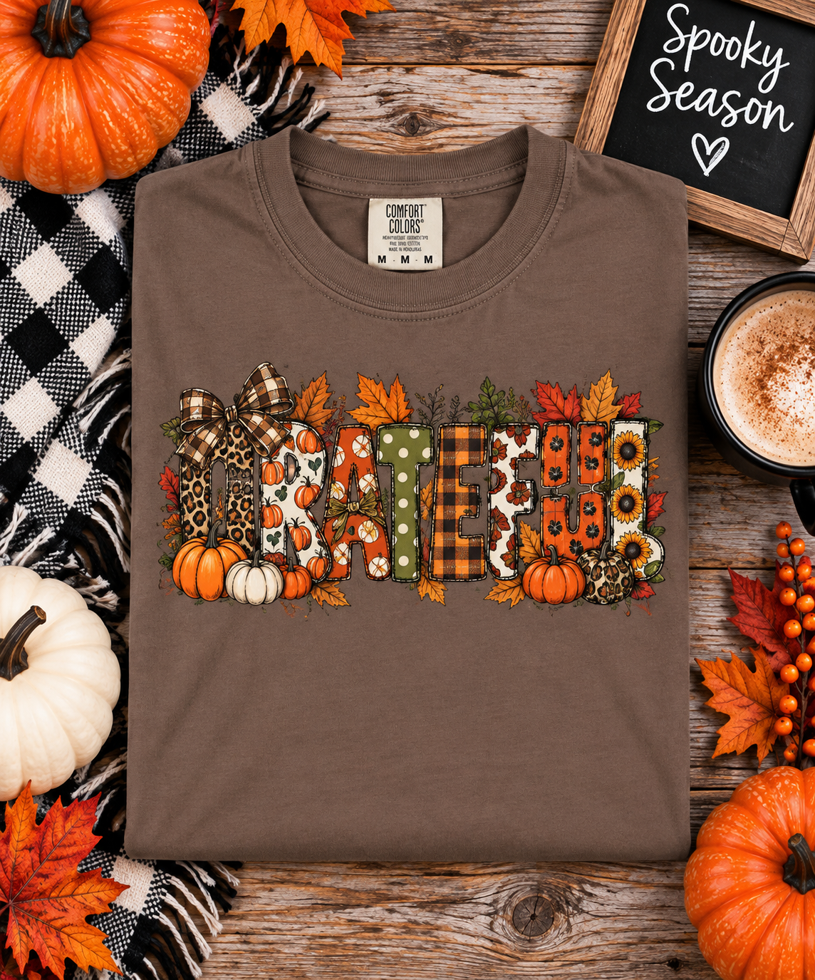 Grateful fall teacher shirt flat lay featuring an autumn-inspired graphic