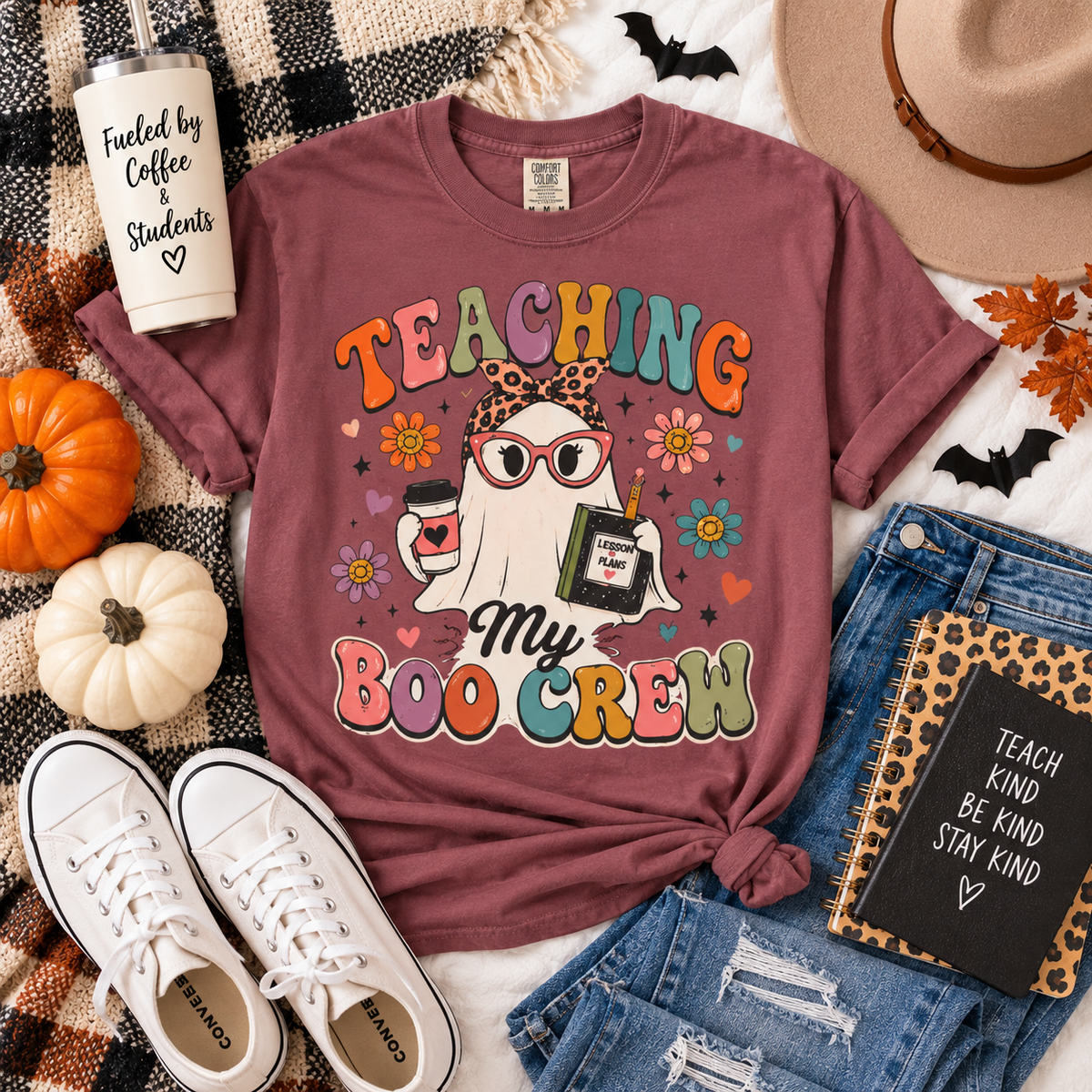Teaching My Boo Crew Halloween teacher shirt flat lay in Brick with retro spooky graphic.