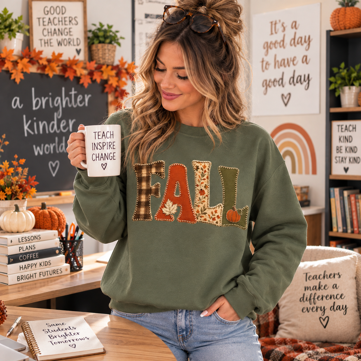 Fall crewneck sweatshirt with colorful patchwork-inspired autumn lettering.