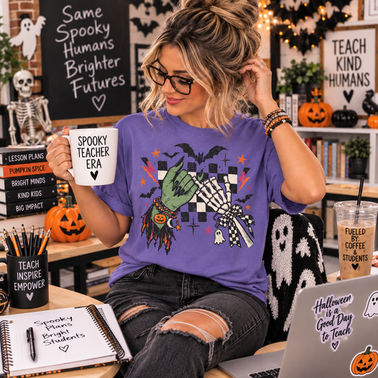 Grape Comfort Colors Halloween shirt with witch and skeleton pinky promise design.